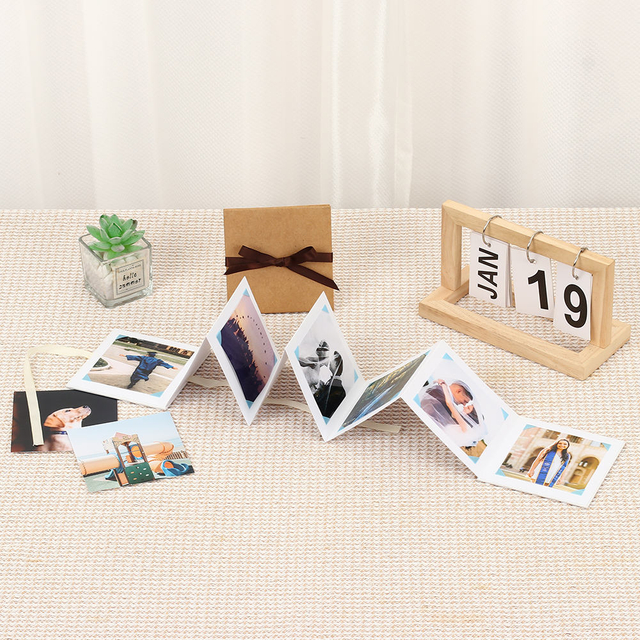 Logo personnalisé en gros Kraft Papier pliant l'accordéon photo album Ribbon Knot Memory Post Carte pour la famille Baby Baby Family